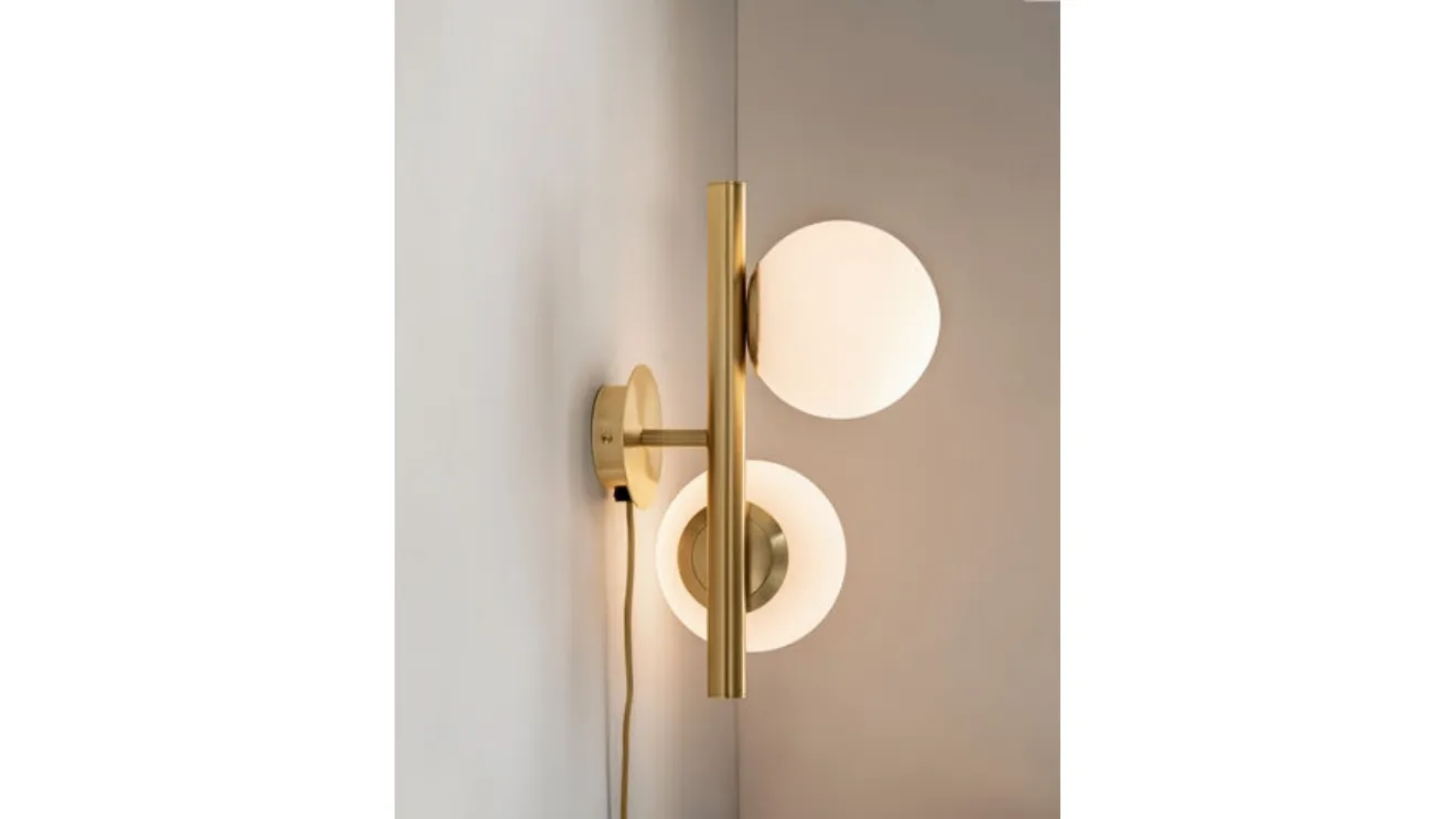 Twist A wall lamp by Riflessi.