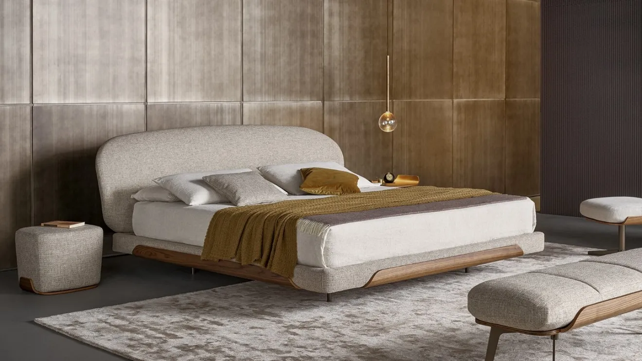 Bed with Olos headboard by Bonaldo.