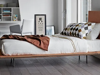 Bed with Thin headboard by Bonaldo.