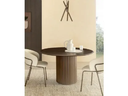 Round wooden Enea table by Riflessi.